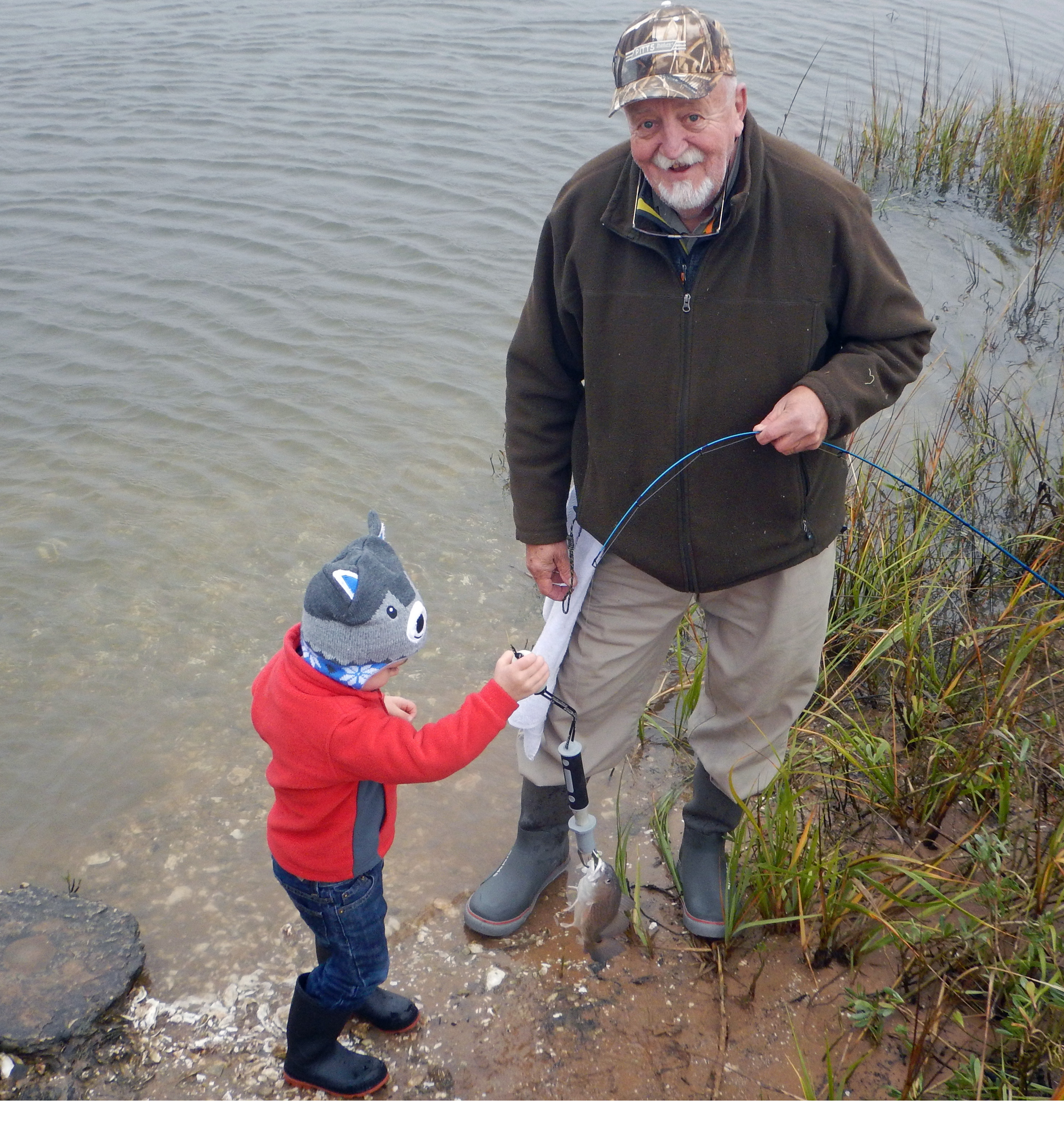 liam gets help from mr steve with a redfish